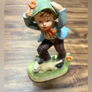 Royal Crown boy holding hat in the wind with cat kitten vintage